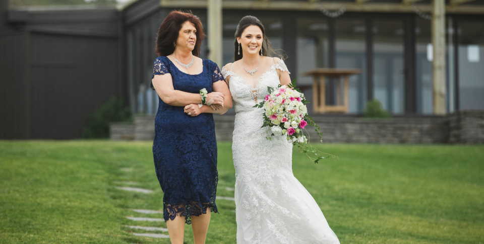 Mother walking daughter outlet down the aisle dress